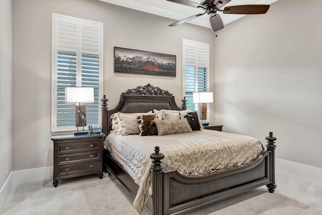 carpeted bedroom featuring ceiling fan