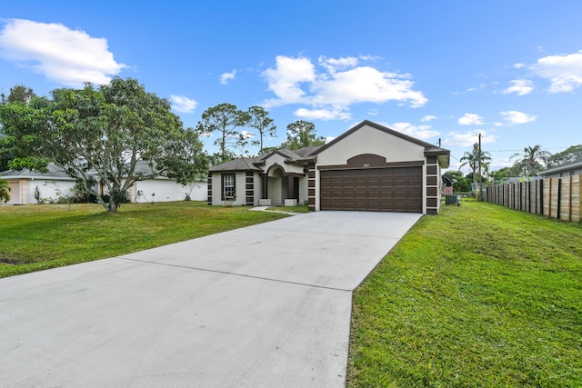 ranch-style house with a garage and a front lawn