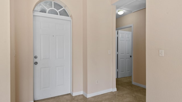 interior space with light tile patterned floors