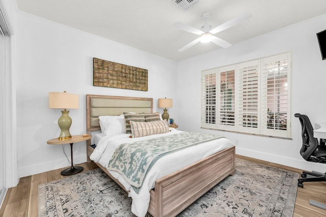 bedroom featuring ceiling fan and light wood-type flooring