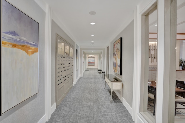 hallway featuring a mail area