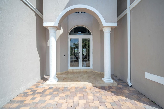 doorway to property featuring french doors