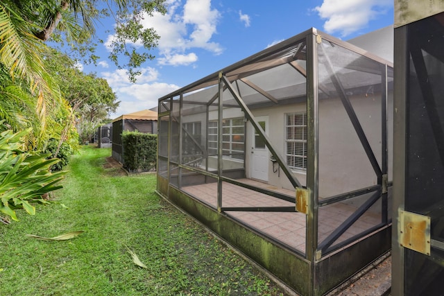 view of yard featuring a lanai and a patio