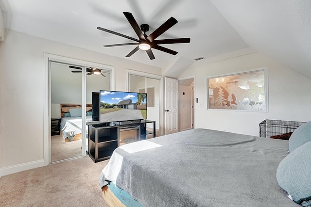 bedroom featuring ceiling fan, light carpet, and vaulted ceiling