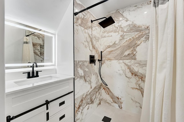 bathroom featuring a shower with shower curtain, vanity, and tile walls