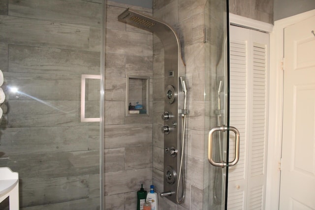 bathroom featuring an enclosed shower