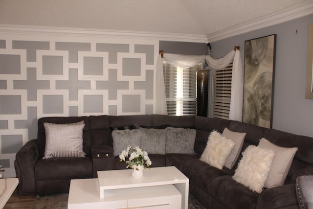 living room with crown molding, wood-type flooring, and a textured ceiling