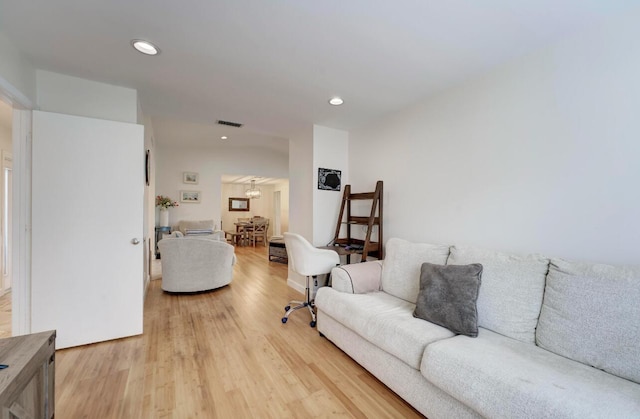 living room with light hardwood / wood-style floors