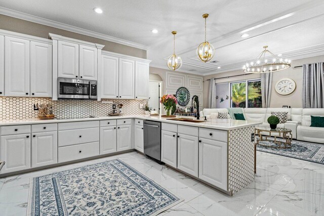 dining room with crown molding and an inviting chandelier