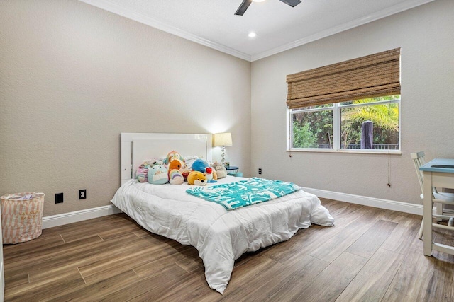 bedroom featuring crown molding, ceiling fan, baseboards, recessed lighting, and wood finished floors