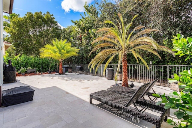 view of patio / terrace with fence