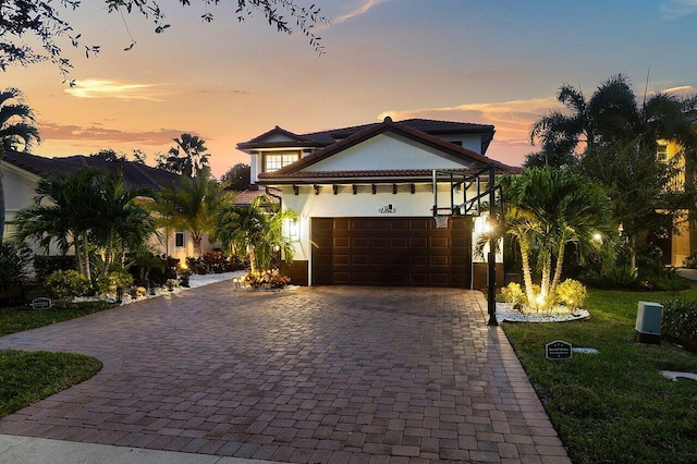 view of front of home with a garage