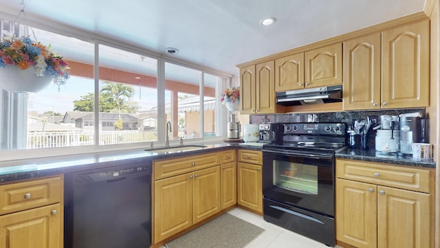 kitchen featuring backsplash, black appliances, sink, dark stone countertops, and light tile patterned flooring