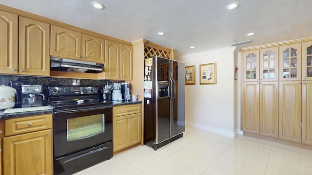 kitchen featuring black appliances, crown molding, dark stone countertops, light tile patterned floors, and tasteful backsplash