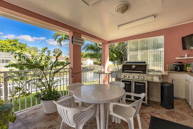 view of patio with a balcony and grilling area