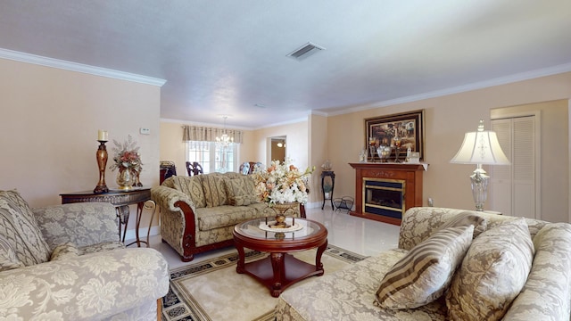 living room with crown molding and a notable chandelier