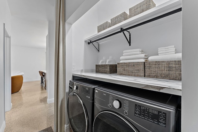 laundry area with washer and clothes dryer