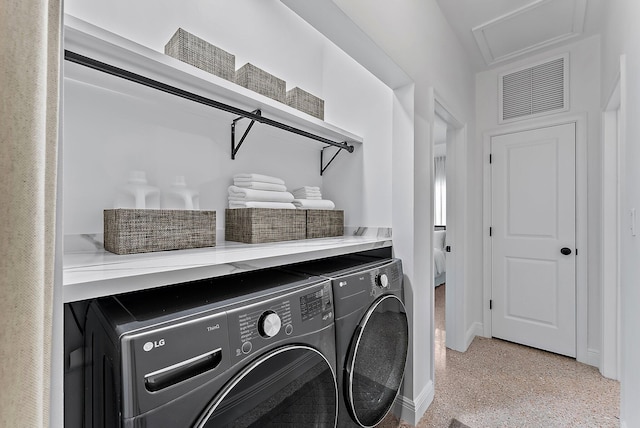 513 E Whitney Dr, Jupiter, FL 33458 - laundry room with separate washer and dryer and baseboards