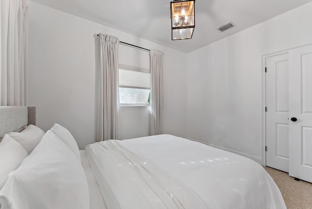513 E Whitney Dr, Jupiter, FL 33458 - bedroom with dark aggregate flooring