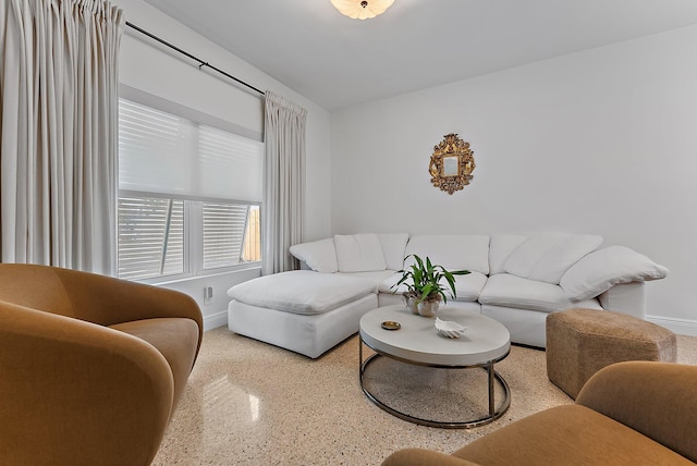 513 E Whitney Dr, Jupiter, FL 33458 - living room featuring speckle patterned floor and baseboards