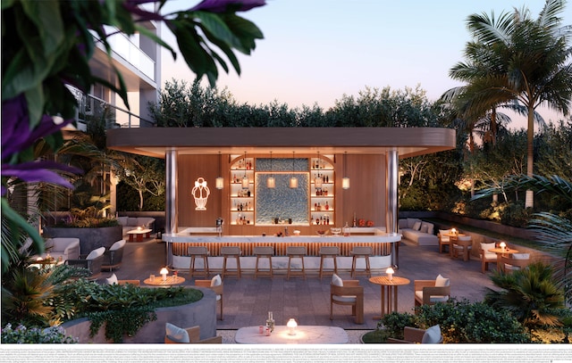 view of patio / terrace featuring an outdoor living space with a fire pit