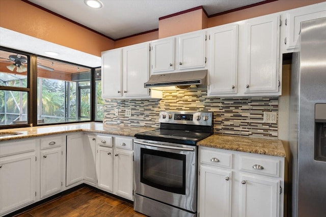 kitchen featuring white cabinetry, light stone countertops, and appliances with stainless steel finishes