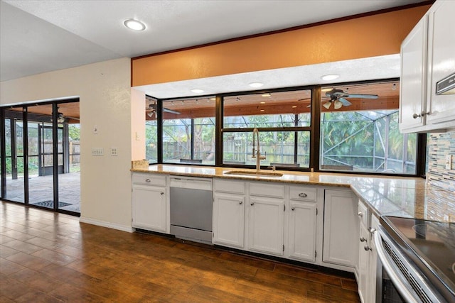 kitchen with sink, white cabinets, and dishwasher