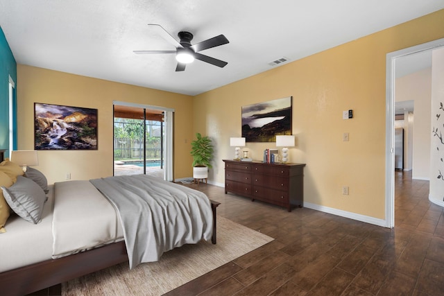 bedroom with dark hardwood / wood-style floors, ceiling fan, and access to exterior