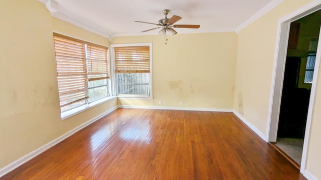 unfurnished room with crown molding, hardwood / wood-style floors, and ceiling fan