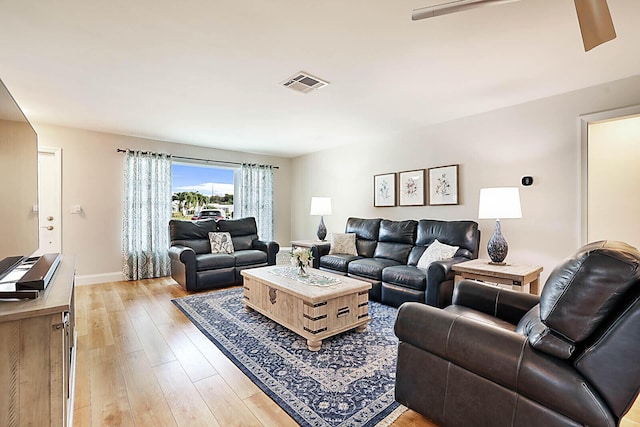 living room featuring light wood-type flooring