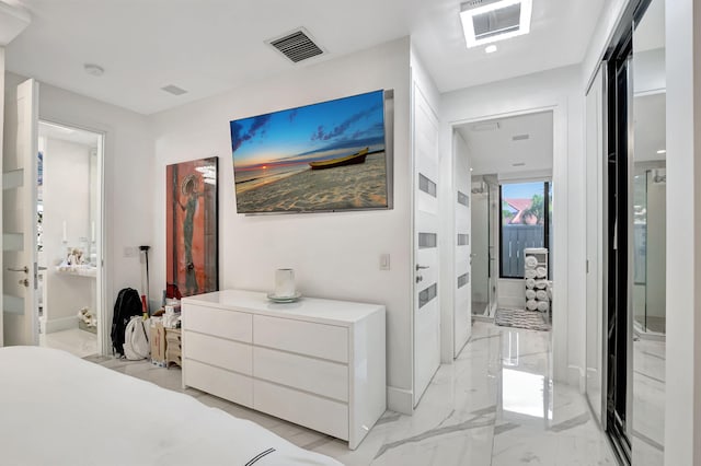 bedroom featuring ensuite bathroom