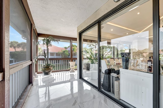 sunroom with a healthy amount of sunlight