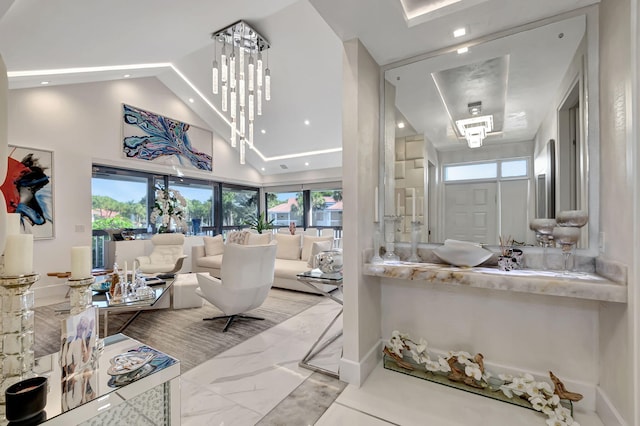 interior space with plenty of natural light and a notable chandelier