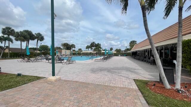 view of swimming pool featuring a patio