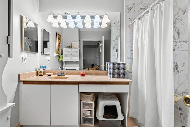 bathroom featuring vanity and walk in shower