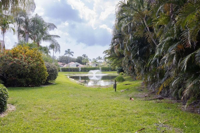 view of yard with a water view