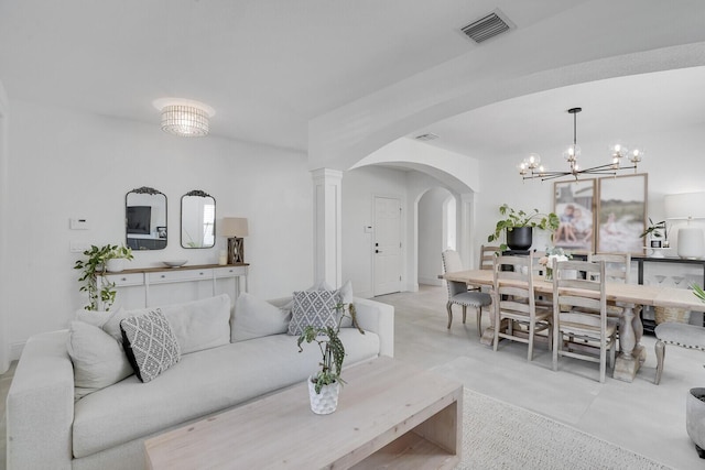 living room with a chandelier