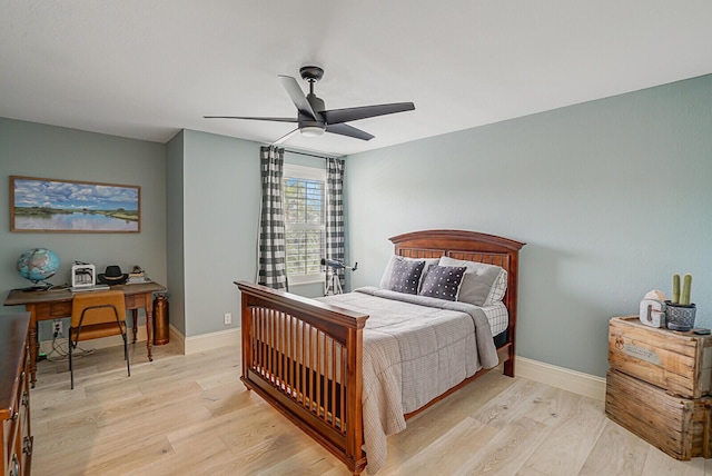 bedroom with ceiling fan and light wood-type flooring