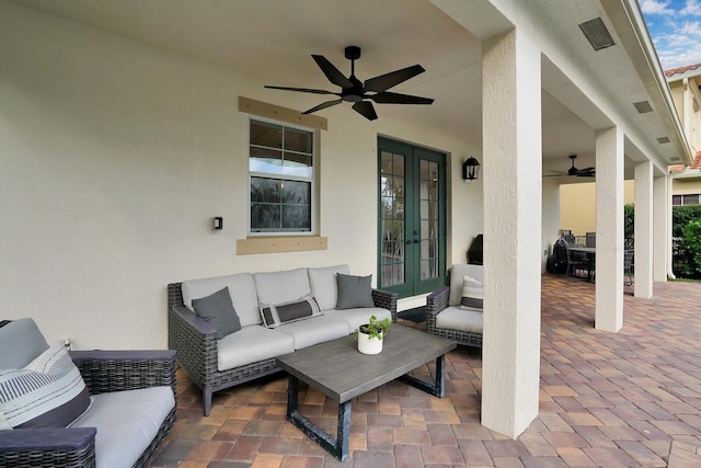 view of patio with outdoor lounge area and french doors