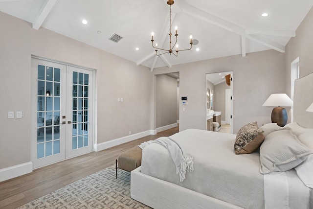 bedroom with access to outside, french doors, vaulted ceiling with beams, light wood-type flooring, and connected bathroom