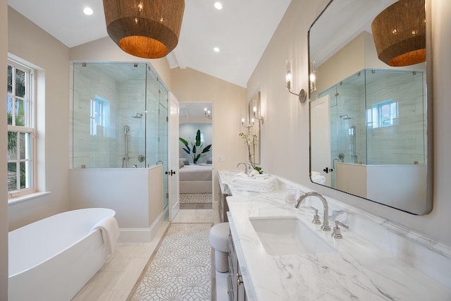 bathroom featuring vanity, lofted ceiling, and shower with separate bathtub