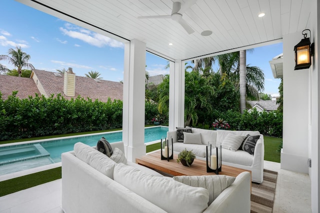 sunroom / solarium featuring ceiling fan and wood ceiling