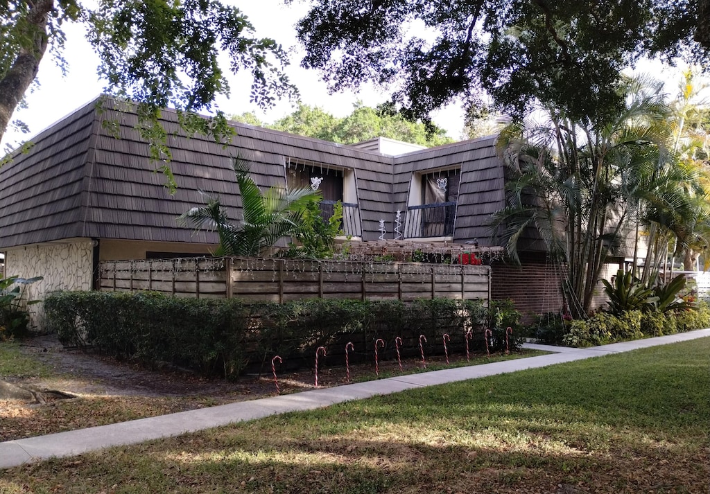 exterior space with a front lawn