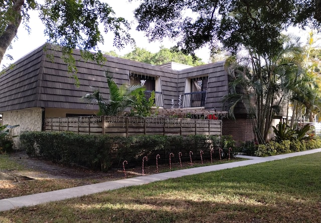 exterior space with a front lawn