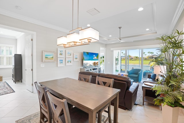 dining area featuring a wealth of natural light, ceiling fan, and crown molding