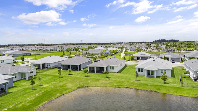 bird's eye view with a water view