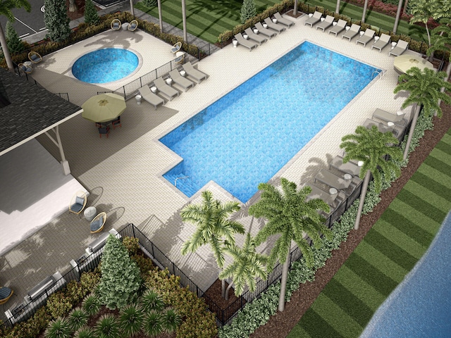 view of swimming pool featuring a patio area