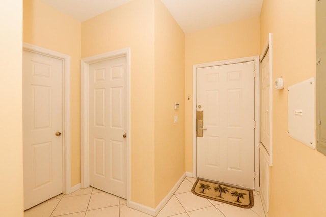 entryway featuring light tile patterned floors