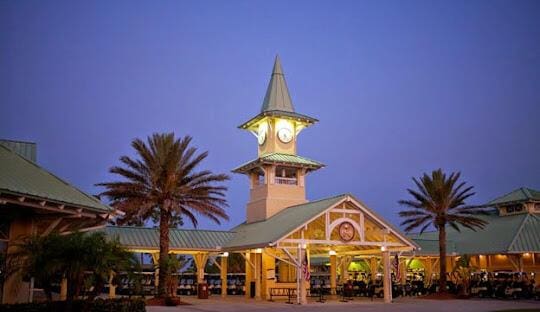 view of outdoor building at dusk