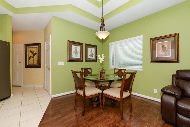 dining space featuring light wood-type flooring